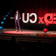 TEDxCU speaker on stage